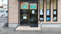 小石調剤薬局の入口