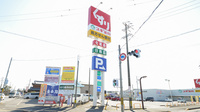 スギ薬局　亀山栄店の看板