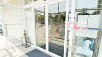 ココカラファイン薬局青竹店の入口