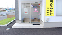コスモファーマ薬局ひたち野店の入口
