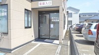 横手ファミリー調剤薬局の入口