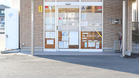 平成調剤薬局日野店の入口
