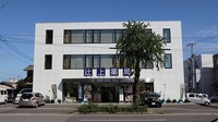 有限会社　辻上薬局　今里店の外観