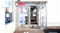 トリム薬局 春日新田店の入口