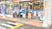 ローソンクオール薬局三郷谷中店の入口