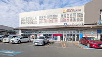 薬局トモズグリーンマークシティ松戸新田店の外観